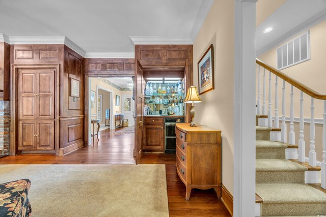 1259 Oatland Lake Rd, Pawleys Island, SC 29585 - office with crown molding, wood finished floors, and a bar