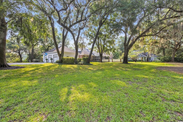 1259 Oatland Lake Rd, Pawleys Island, SC 29585 - view of grassy yard featuring a garage