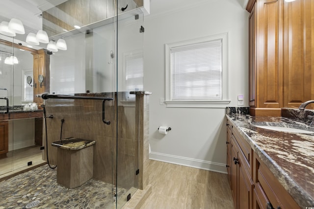 1259 Oatland Lake Rd, Pawleys Island, SC 29585 - bathroom featuring vanity, a shower stall, crown molding, and baseboards