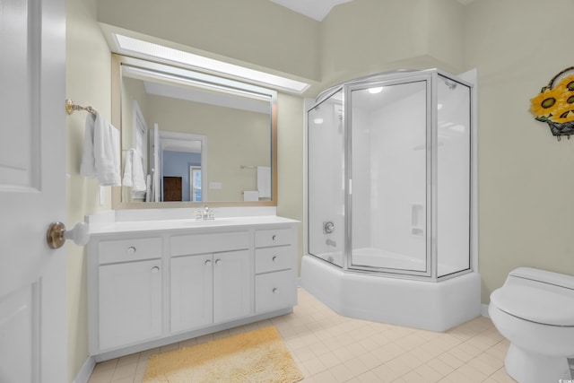 1259 Oatland Lake Rd, Pawleys Island, SC 29585 - full bathroom featuring vanity, toilet, tile patterned flooring, and shower / bath combination with glass door