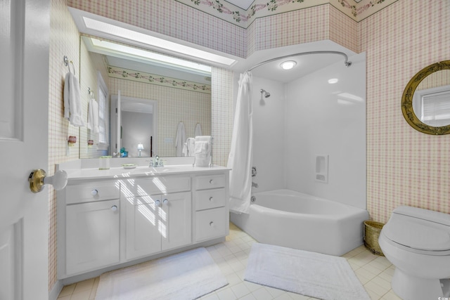 1259 Oatland Lake Rd, Pawleys Island, SC 29585 - bathroom with wallpapered walls, shower / bath combo with shower curtain, toilet, vanity, and tile patterned floors