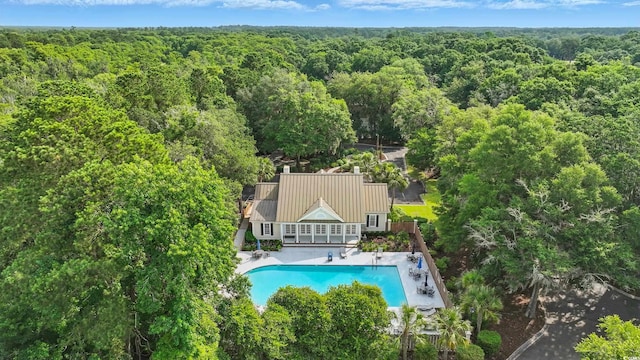 1259 Oatland Lake Rd, Pawleys Island, SC 29585 - view of subject property with a forest and a pool area