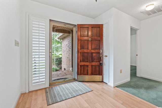 1468 Fox Hollow Way N, Myrtle Beach, SC 29582 - foyer entrance featuring baseboards and wood finished floors