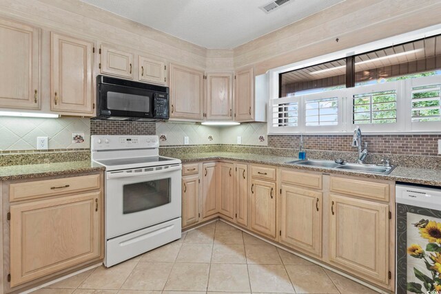 1468 Fox Hollow Way N, Myrtle Beach, SC 29582 - kitchen with black microwave, electric stove, a sink, and light brown cabinets