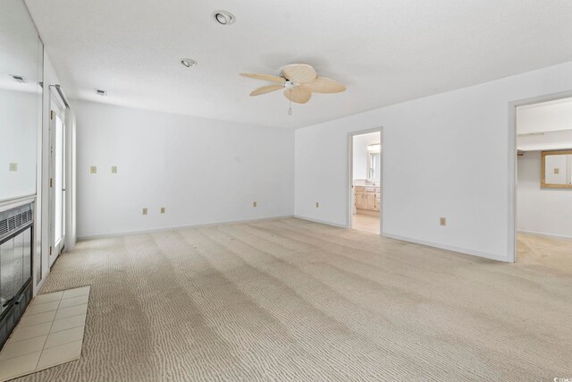 1468 Fox Hollow Way N, Myrtle Beach, SC 29582 - unfurnished living room featuring ceiling fan, light carpet, and baseboards