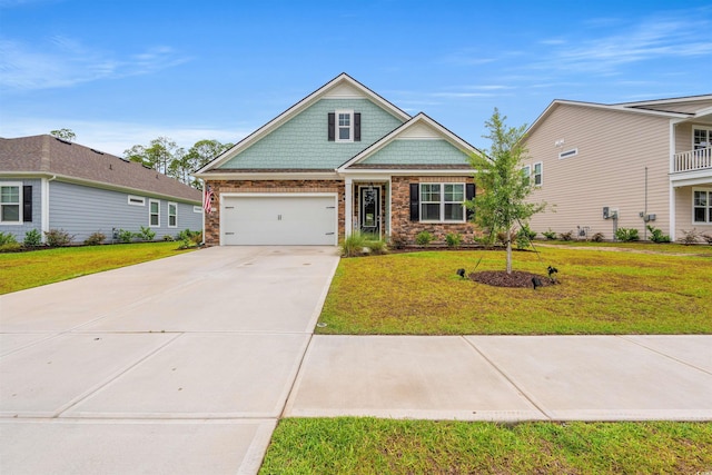 1523 Wood Stork Dr, Conway, SC 29526 - craftsman-style house featuring concrete driveway, a front lawn, a garage, and stone siding