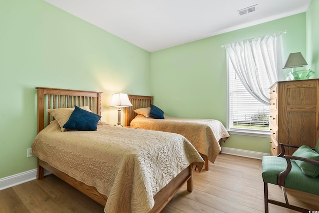 106 Cypress Creek Dr, Murrells Inlet, SC 29576 - bedroom featuring baseboards and light wood-style flooring