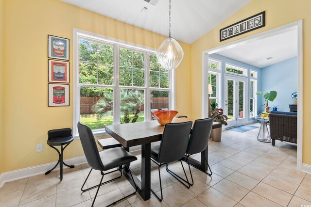 106 Cypress Creek Dr, Murrells Inlet, SC 29576 - dining space featuring healthy amount of natural light, baseboards, vaulted ceiling, and light tile patterned floors