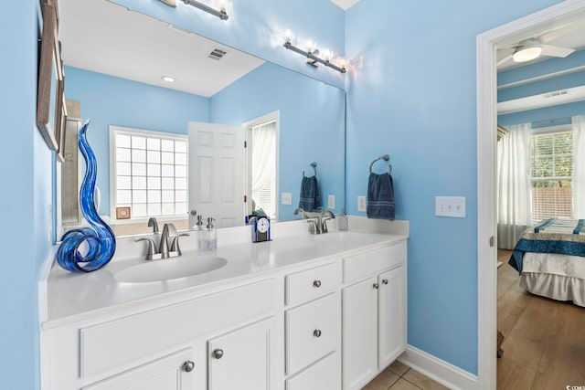 106 Cypress Creek Dr, Murrells Inlet, SC 29576 - ensuite bathroom with double vanity and baseboards