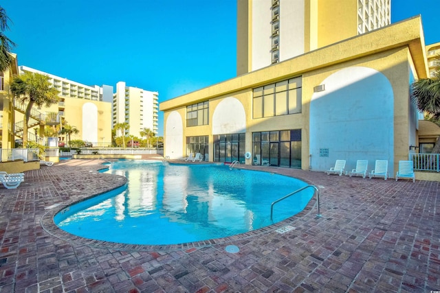 1207 S Ocean Blvd Unit 50809, Myrtle Beach, SC 29577 - community pool featuring a patio