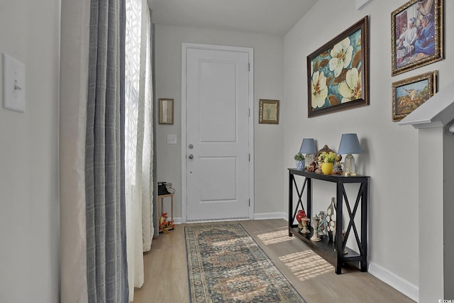 79 S Reindeer Rd, Surfside Beach, SC 29575 - entryway with wood finished floors and baseboards