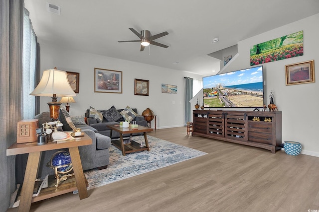 79 S Reindeer Rd, Surfside Beach, SC 29575 - living area featuring ceiling fan, wood finished floors, and baseboards