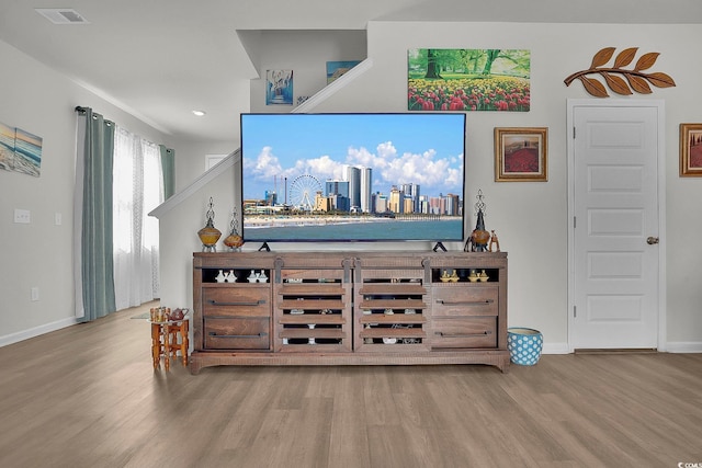 79 S Reindeer Rd, Surfside Beach, SC 29575 - living area featuring wood finished floors, baseboards, and recessed lighting