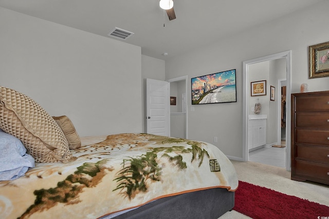 79 S Reindeer Rd, Surfside Beach, SC 29575 - carpeted bedroom with ensuite bathroom and ceiling fan