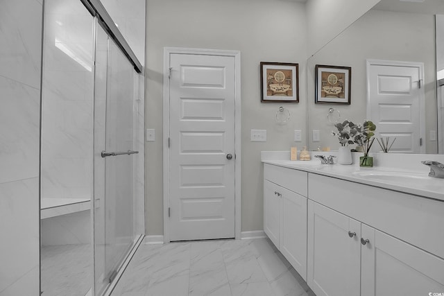 79 S Reindeer Rd, Surfside Beach, SC 29575 - bathroom featuring marble look tile flooring, double vanity, a shower stall, and baseboards