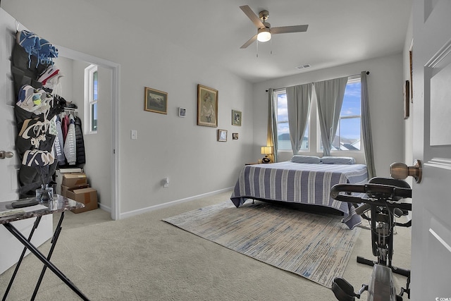 79 S Reindeer Rd, Surfside Beach, SC 29575 - bedroom with carpet flooring, a ceiling fan, and baseboards