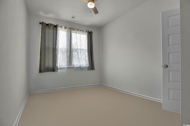 79 S Reindeer Rd, Surfside Beach, SC 29575 - spare room with a ceiling fan and baseboards