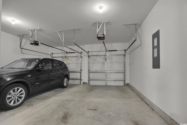 79 S Reindeer Rd, Surfside Beach, SC 29575 - garage with a garage door opener and electric panel