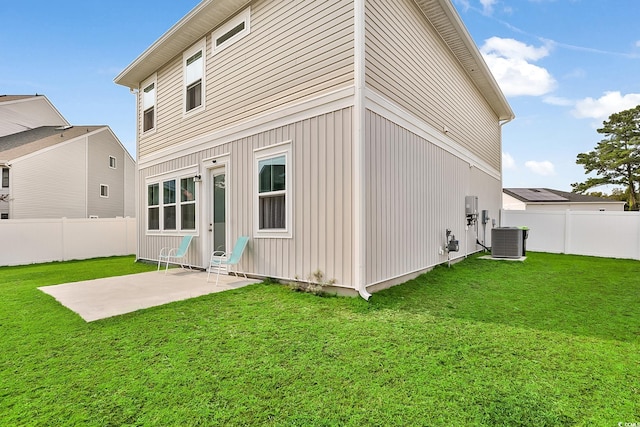 79 S Reindeer Rd, Surfside Beach, SC 29575 - rear view of property with cooling unit, a patio area, and entry steps