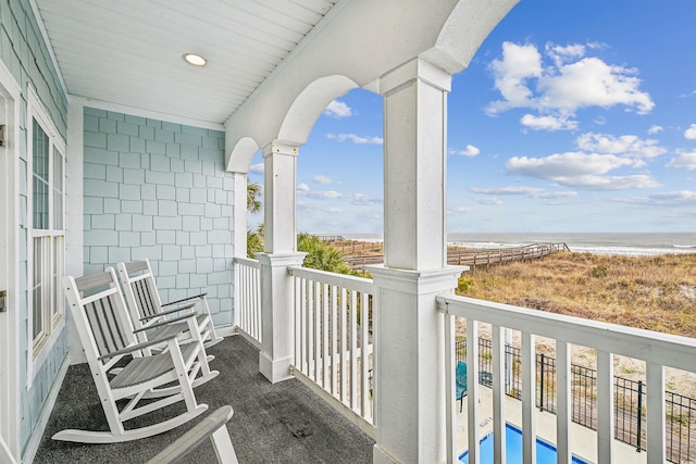 931 S Ocean Blvd, North Myrtle Beach, SC 29582 - balcony with view of water and beach