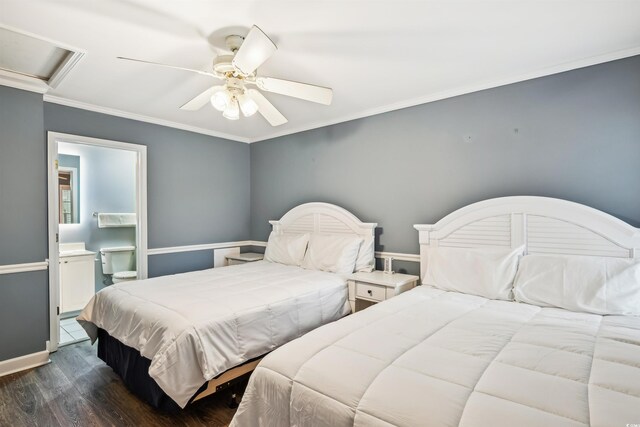 931 S Ocean Blvd, North Myrtle Beach, SC 29582 - bedroom featuring attic access, dark wood-type flooring, ceiling fan, crown molding, and connected bathroom