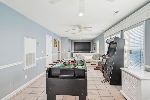 931 S Ocean Blvd, North Myrtle Beach, SC 29582 - rec room with ceiling fan and light tile patterned flooring