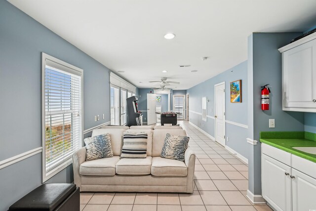 931 S Ocean Blvd, North Myrtle Beach, SC 29582 - living room featuring a ceiling fan, light tile patterned floors, and recessed lighting