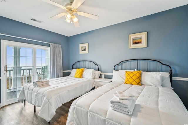 931 S Ocean Blvd, North Myrtle Beach, SC 29582 - bedroom with wood finished floors, access to exterior, and a ceiling fan