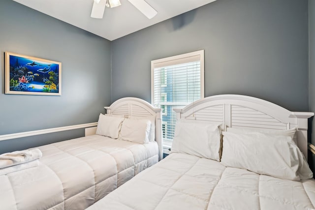 931 S Ocean Blvd, North Myrtle Beach, SC 29582 - bedroom with a ceiling fan