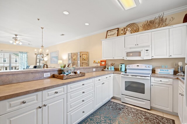 4142 Hibiscus Dr Unit 20-202, Little River, SC 29566 - kitchen with white appliances, light tile patterned flooring, white cabinetry, light countertops, and crown molding