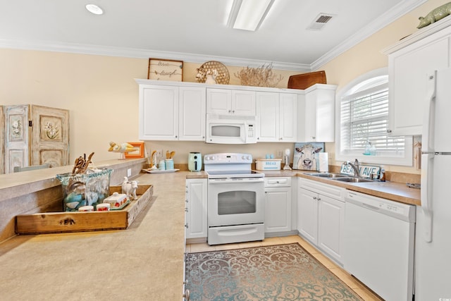 4142 Hibiscus Dr Unit 20-202, Little River, SC 29566 - kitchen with white appliances, crown molding, light countertops, and white cabinetry