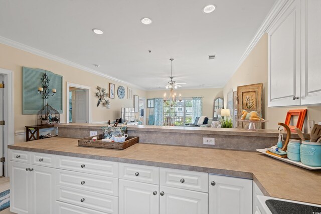 4142 Hibiscus Dr Unit 20-202, Little River, SC 29566 - kitchen featuring white cabinetry, ornamental molding, light countertops, ceiling fan, and recessed lighting
