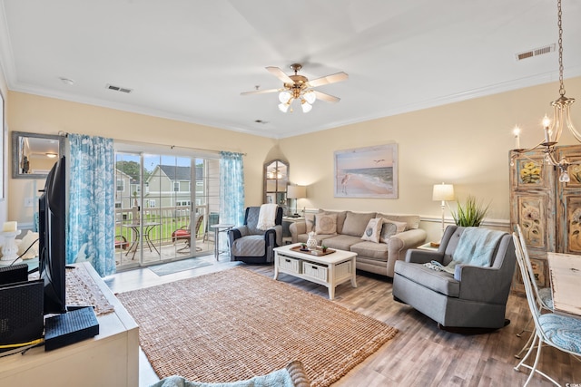 4142 Hibiscus Dr Unit 20-202, Little River, SC 29566 - living room with a ceiling fan, wood finished floors, and crown molding
