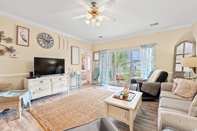 4142 Hibiscus Dr Unit 20-202, Little River, SC 29566 - living room featuring a ceiling fan, wood finished floors, and crown molding
