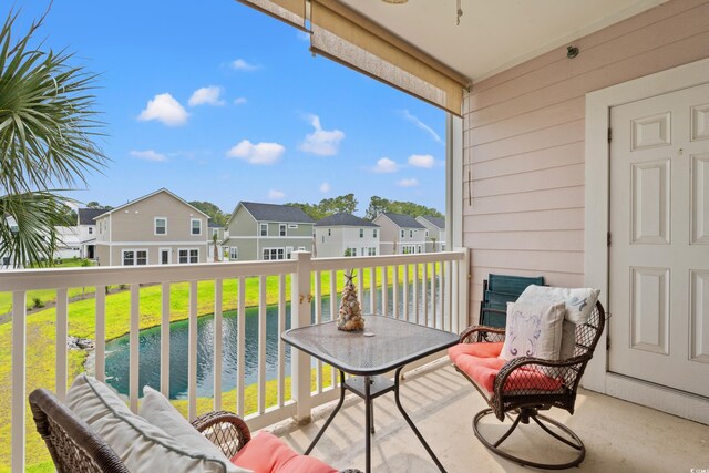 4142 Hibiscus Dr Unit 20-202, Little River, SC 29566 - balcony with a residential view and outdoor lounge area