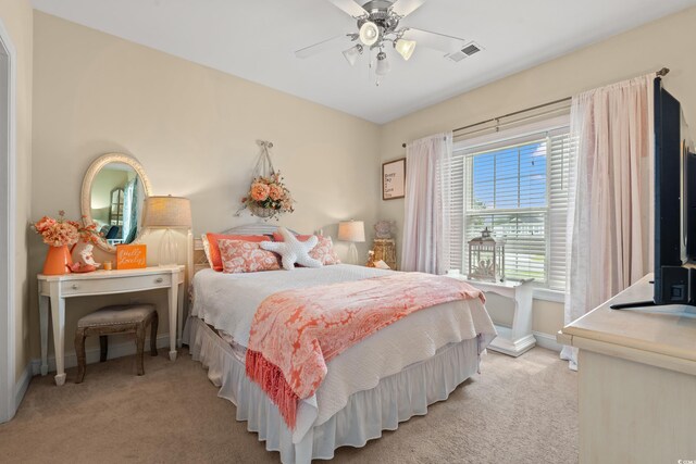 4142 Hibiscus Dr Unit 20-202, Little River, SC 29566 - bedroom with light carpet, baseboards, and a ceiling fan