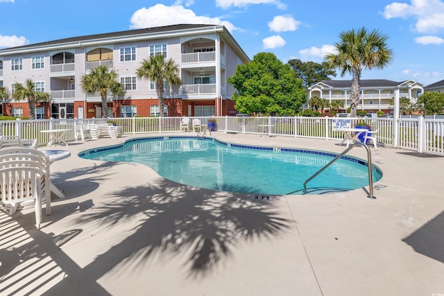 4142 Hibiscus Dr Unit 20-202, Little River, SC 29566 - community pool featuring a patio