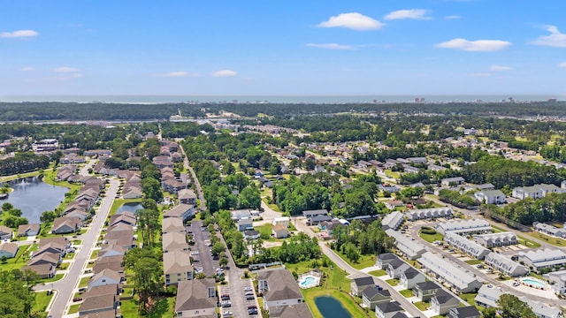 4142 Hibiscus Dr Unit 20-202, Little River, SC 29566 - aerial view of property and surrounding area featuring a large body of water and nearby suburban area