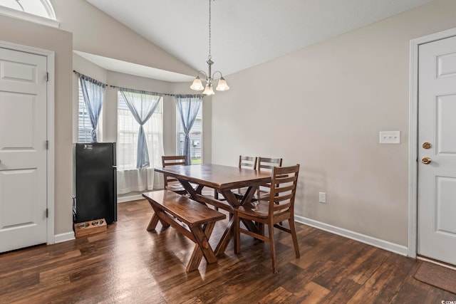 282 Foxpath Loop, Myrtle Beach, SC 29588 - dining room featuring lofted ceiling, dark wood finished floors, a chandelier, and baseboards
