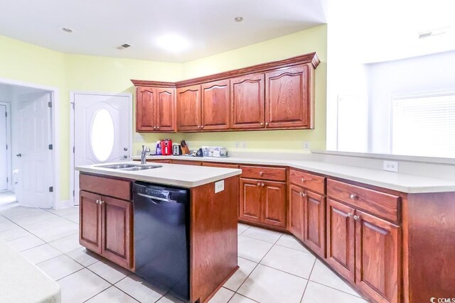2499 Burning Tree Ln, Little River, SC 29566 - kitchen featuring dishwasher, a sink, light tile patterned floors, and a kitchen island with sink
