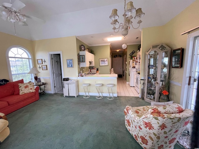 4753 Wild Iris Dr Unit 301, Myrtle Beach, SC 29577 - living area with light colored carpet, a ceiling fan, a chandelier, crown molding, and baseboards