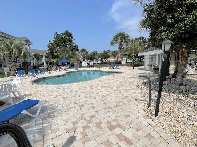 4753 Wild Iris Dr Unit 301, Myrtle Beach, SC 29577 - community pool with a patio area