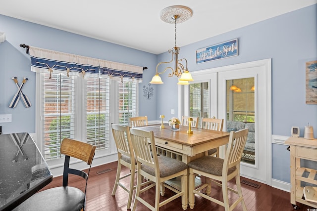 504 Sea Vista Ln, North Myrtle Beach, SC 29582 - dining area with hardwood / wood-style floors and a chandelier