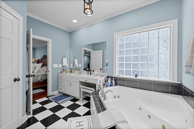504 Sea Vista Ln, North Myrtle Beach, SC 29582 - ensuite bathroom with a whirlpool tub, vanity, crown molding, and baseboards