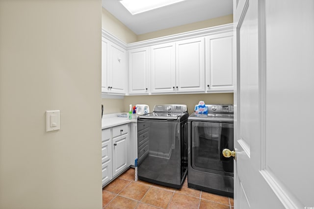 504 Sea Vista Ln, North Myrtle Beach, SC 29582 - laundry area featuring cabinet space, separate washer and dryer, and light tile patterned flooring