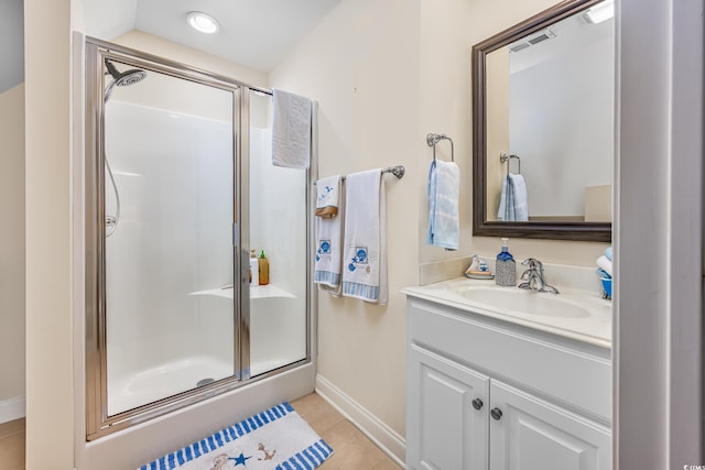 504 Sea Vista Ln, North Myrtle Beach, SC 29582 - full bath with a shower stall, vanity, baseboards, and tile patterned floors