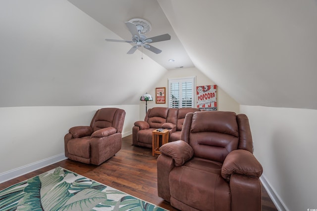504 Sea Vista Ln, North Myrtle Beach, SC 29582 - sitting room with vaulted ceiling, dark wood-style floors, a ceiling fan, and baseboards