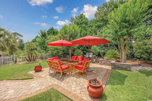 504 Sea Vista Ln, North Myrtle Beach, SC 29582 - view of patio / terrace with outdoor dining space and a grill