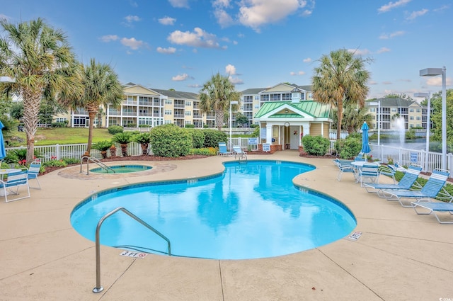 504 Sea Vista Ln, North Myrtle Beach, SC 29582 - community pool featuring a hot tub and a patio