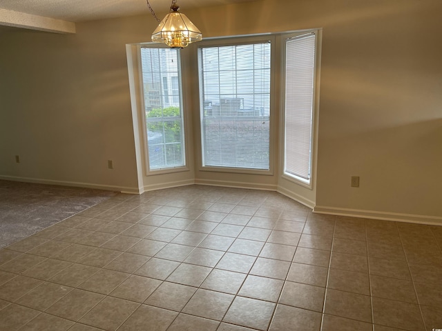 770 Charter Dr Unit C4, Longs, SC 29568 - tiled spare room featuring a chandelier and baseboards